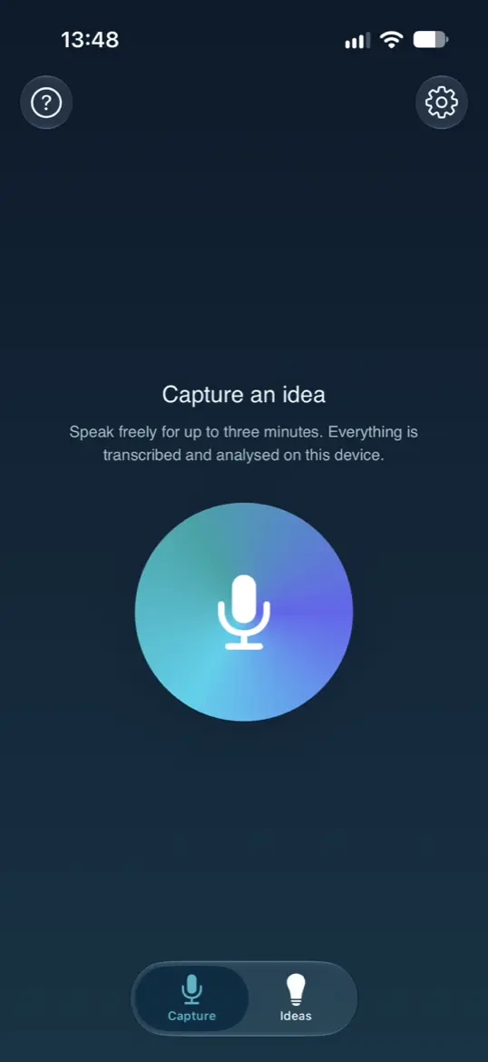 The Capture tab: a single large microphone button on an otherwise empty screen, above the prompt &ldquo;Speak freely for up to three minutes.&rdquo; Shown in dark appearance.